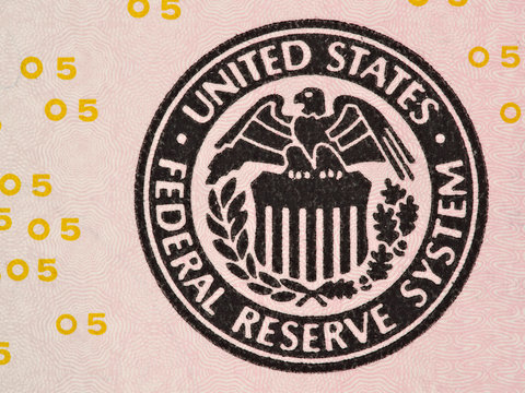 Seal of the Federal Reserve System on the us  5 dollar bill macro, united states money closeup
