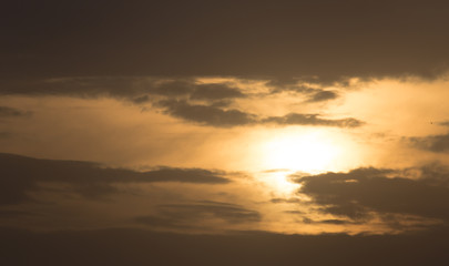 storm clouds at sunset as background