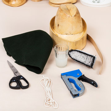 felt hood, wooden dummy and tools for millinery