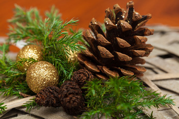 Christmas Decoration with Baubles and Spruce Cones