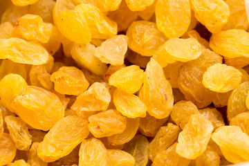Golden raisins close-up background