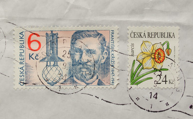 Czech stamps over a mail envelope