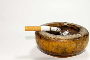 Bad addiction. Ashtray and cigarettes close-up.