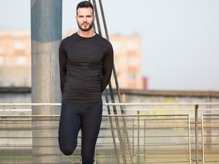 Jogging Healthy Looking Young Man Cross Bridge Under Morning Sun