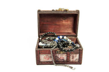 A wooden treasure chest filled with loot.