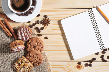 Coffee, cookies and notepad