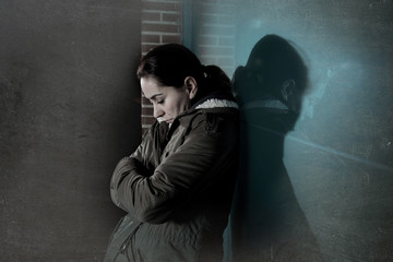  sad woman alone leaning on street window at night suffering dep