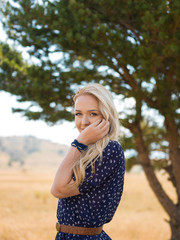 happy young woman  under the trees