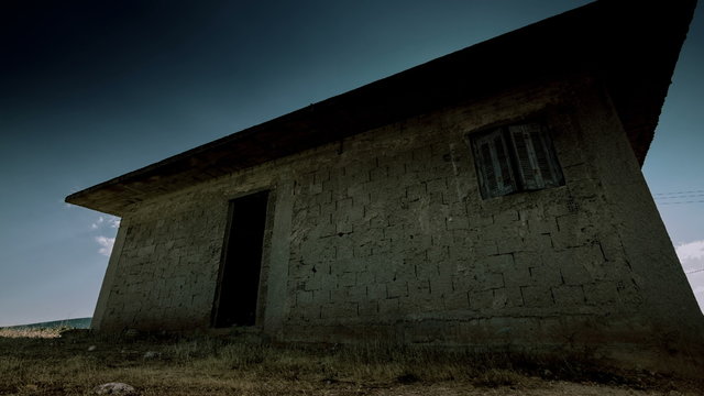 4K abandoned derelict house exterior in city outskirts motion control timelapse