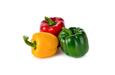 red yellow green bell pepper on white background