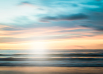 Naklejka na ściany i meble An abstract seascape with blurred panning motion background