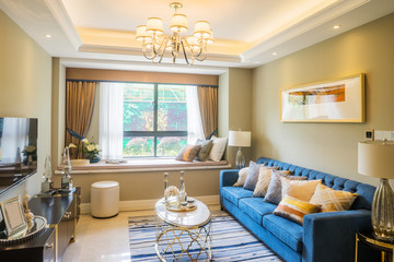 interior of living room with big window and beautiful couch