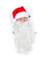 Santa Claus looking through hole in a white wall