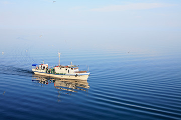 Boat in the Small Sea Strait of Lake Baikal..