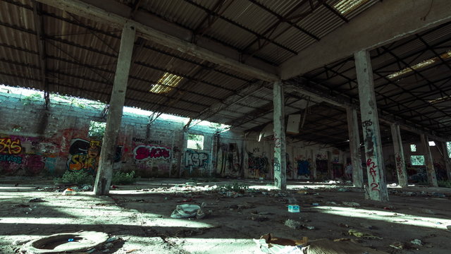 4K motion control pan abandoned derelict factory/warehouse interior 25p