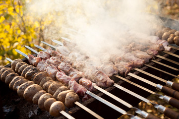 beef and pork steak bbq on the grill