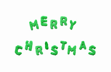 Merry Christmasword made of alphabet from sand