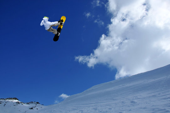 snow boarder jumping