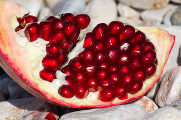 Part of pomegranate fruit. Organic fresh juicy product