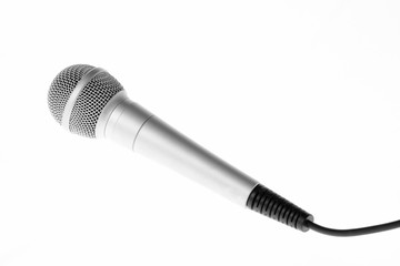 Concert microphone with cord isolated on white background