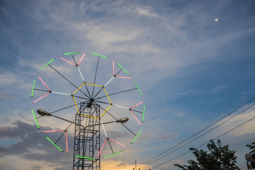 twilight time,small moon and decorate light in urban fair of  Th