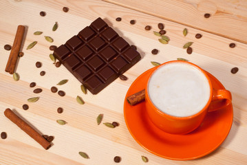 Cup of coffee on  wooden background