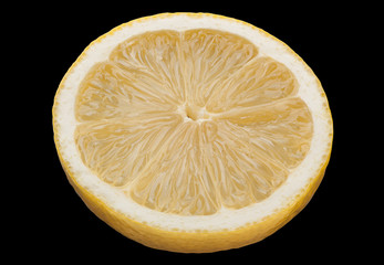 Lemon citrus fruit slice on black © Tatyana Nyshko