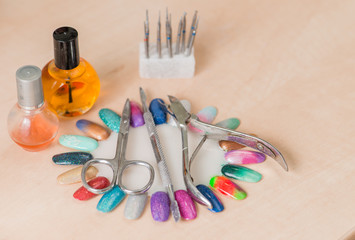 bottles and tools for manicure after work close-up in nail salon
