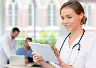 Portrait of a young attractive doctor at the hospital