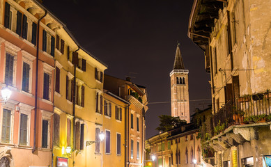 Obraz premium Ponte di Pietra street, campanile of Santa Anastasia church - Ve