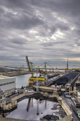 Fototapeta na wymiar deposito di carbone al porto di Genova