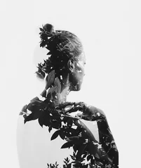 Creative double exposure portrait of attractive girl with branches of tree © iana_kolesnikova