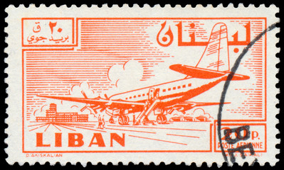 Stamp printed in Lebanon shows Douglas DC-6B plane