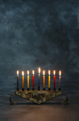 Menorah with burning candles for Hanukkah