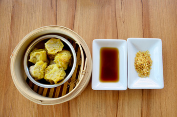 Kind of Chinese snacks steamed dumplings with Sauce and seasonin