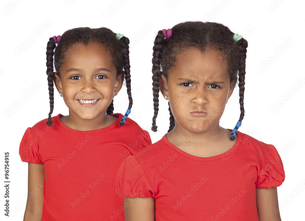 Wall mural Afroamerican twins, one happy and the other very angry