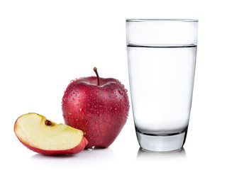 Glass of water and apple isolated on white background