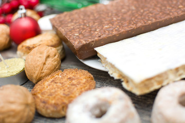 Fototapeta na wymiar Nougat and other Christmas sweets