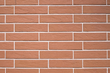 Decorative relief cladding slabs imitating bricks on wall