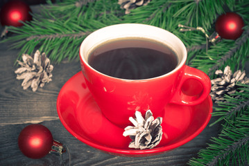 Obraz na płótnie Canvas Hot coffee in a red cup
