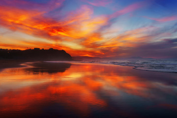 Fototapeta na wymiar red sunset in Sopelana beach
