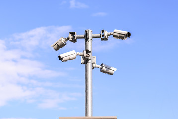 CCTV security camera for surveillance operaiting events in city.