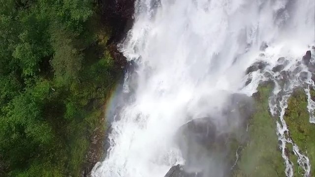 Flying over massive Svandalsfossen waterfall in Norway. Aerial 4k Ultra HD.