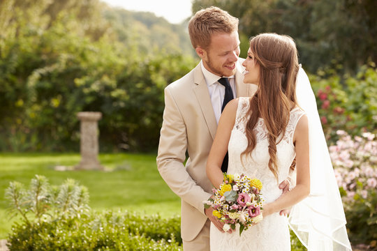 Romantic Young Couple Getting Married Outdoors