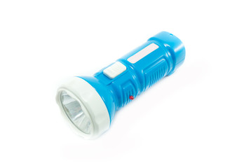 Small LED  flashlight  on white background