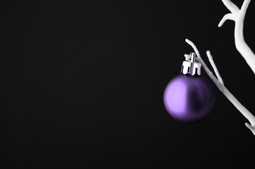 Purple Christmas Bauble on White Tree with Black Background