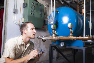Air Conditioner Repair Man at work