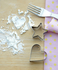Flour with star and heart shape, fork tablecloth
