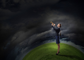 Businesswoman play pipe