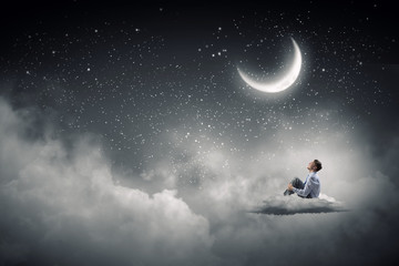 Businessman in night sky